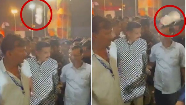 కేజ్రీవాల్ పై ప్లాస్టిక్ బాటిల్ విసిరారు!