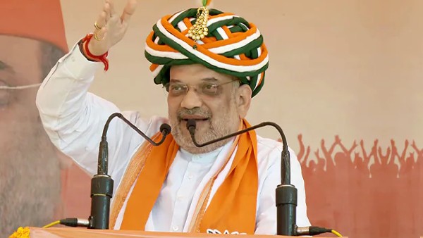 amit shah reminds godra incident in gujarat polls, says taught lesson in 2002 amit shah reminds godra incident in gujarat polls, says taught lesson in 2002