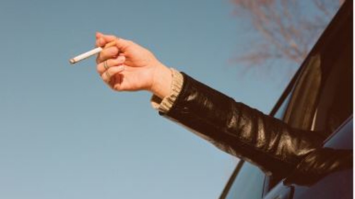 Bengaluru: The young man who smoked a cigarette on the plane, Silently smoking a cigarette in the bathroom on the plane. Bengaluru: The young man who smoked a cigarette on the plane, Silently smoking a cigarette in the bathroom on the plane.