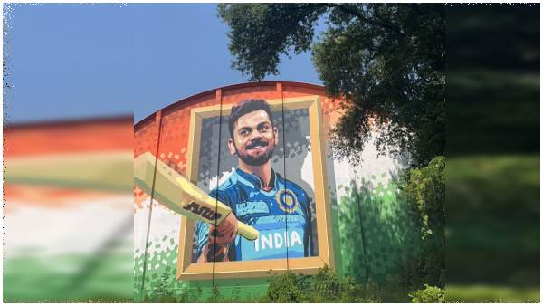 60 feet virat kohli painting on wall in khammam