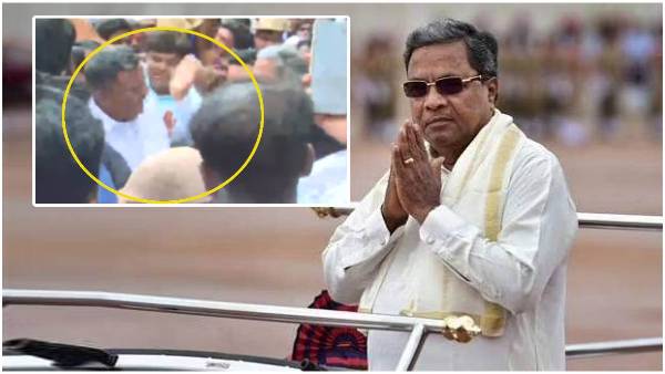 Congress leader Siddaramaiah slaps a supporter at his residence in Bengaluru