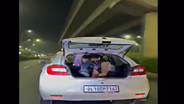 Viral Video: A man was throwing currency notes from his running car in Gurgaon, Police file a case Viral Video: A man was throwing currency notes from his running car in Gurgaon, Police file a case