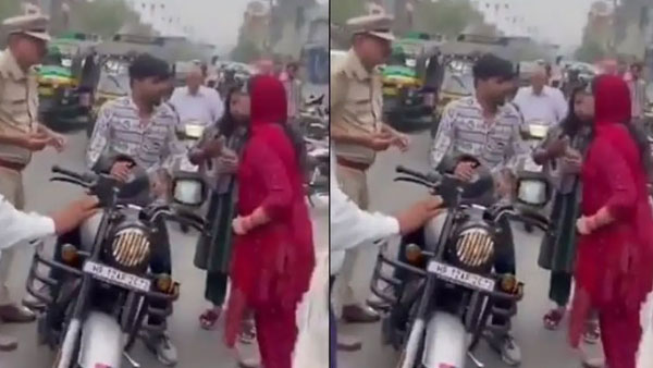 A video of a mother hitting two-wheeler riders for not wearing a helmet is going viral on social media
