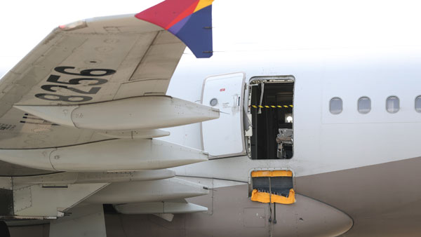 The emergency door opened while the Asiana Airlines flight was in the air in South Korea