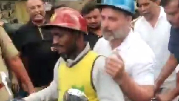 Rahul Gandhi rides a scooter