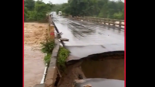 heavy rains in Mulugu: national highway broke at Gundlavagu Bridge; roads blocked to agency villages!!