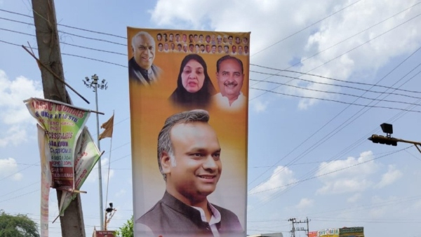 Corporation officials fined the minister for illegally erecting banners in Karnataka. 