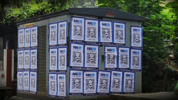 Opposition party leaders with slogans of Pay CS against Pay CM and Pay PM in Karnataka.