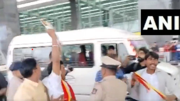 Leaders of Kannada Sanghas protested by entering Bangalore Airport with flight tickets in Bengaluru.