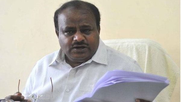 HD Kumaraswamy countered the minister that he did not go to Delhi to hold Amit Shahs legs