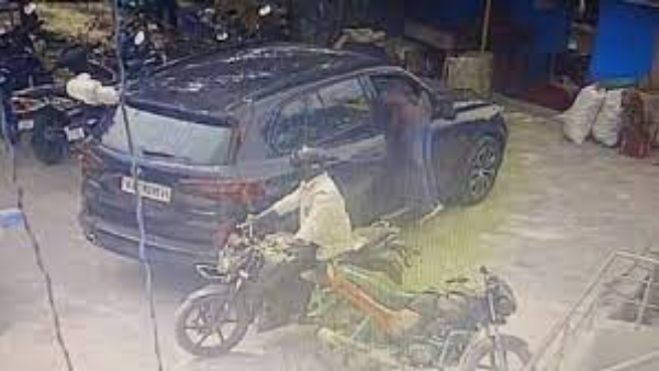 Man caught on CCTV cameras in Bengaluru stealing coconuts from luxury car