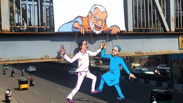 Congress mocks BRS and AIMIM with puppet installed ahead of PM Modis Hyderabad visit