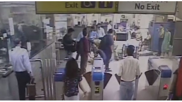 delhi passenger falls unconscious at nangloi metro station, cisf soldier saves life by giving cpr delhi passenger falls unconscious at nangloi metro station, cisf soldier saves life by giving cpr