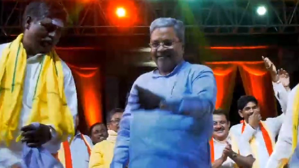 CM Siddaramaiah dances with artists in Hampi