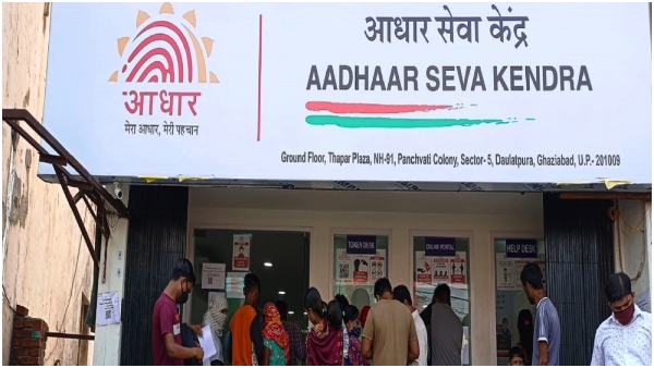 A large number of people lined up at the Aadhaar centers