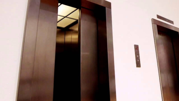 The courier boy died when the lift door opened.