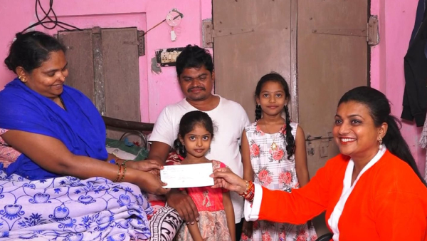 ap minister rk roja turned as santa claus, surprise gifting to poor family on ys jagan birthday
