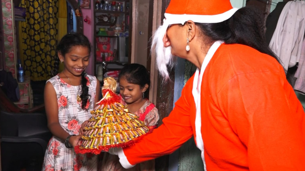 ap minister rk roja turned as santa claus, surprise gifting to poor family on ys jagan birthday