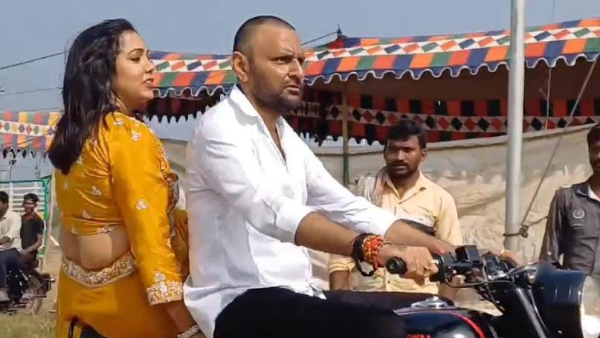 TDP workers troll woman Journalist after she rode pillion on a bike with former minister Kodali Nani TDP workers troll woman Journalist after she rode pillion on a bike with former minister Kodali Nani