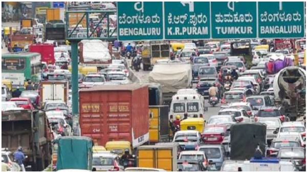 BWSS officers supplying water to people with tankers in Bengaluru city