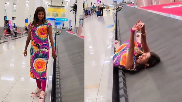 A woman lying on a conveyor belt and making reels