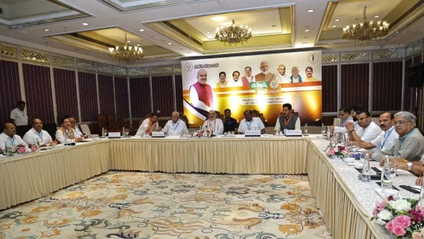 Senior leaders of BJP and JDS parties holding discussions with Union Minister Amit Shah