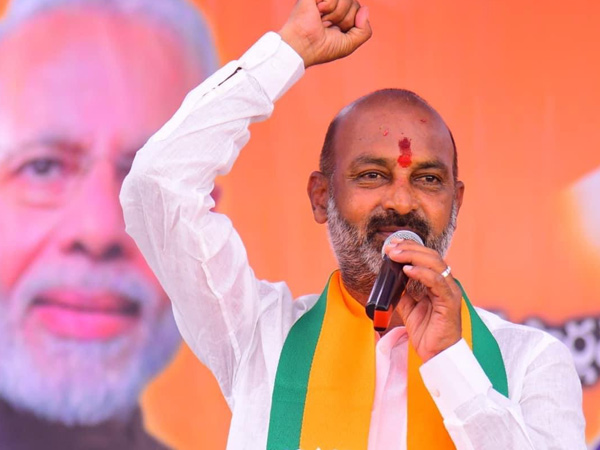 Bandi Sanjay slams congress and brs in husnabad bjp workers meeting