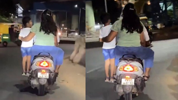 Bengaluru Couple Face Backlash For Riding Scooter With Child Standing On Footrest Bengaluru Couple Face Backlash For Riding Scooter With Child Standing On Footrest
