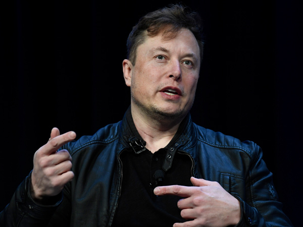 Elon Musk has postponed a planned trip to India