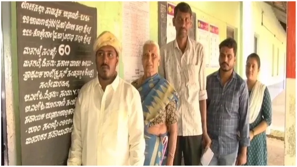 A newly wedded bride who got married after going to the polling station and casting her vote in Karnataka A newly wedded bride who got married after going to the polling station and casting her vote in Karnataka