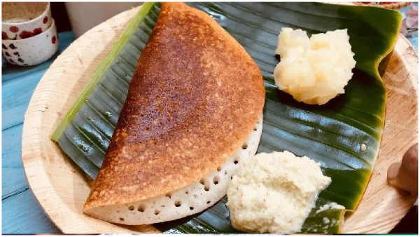 Long queues at Nisarga Grand Hotel in Bengaluru offering free tiffin to voters who display their inked fingers