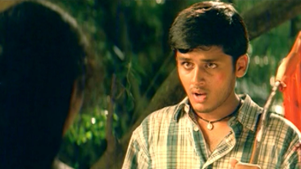 star director hitting hero nithin at shooting spot