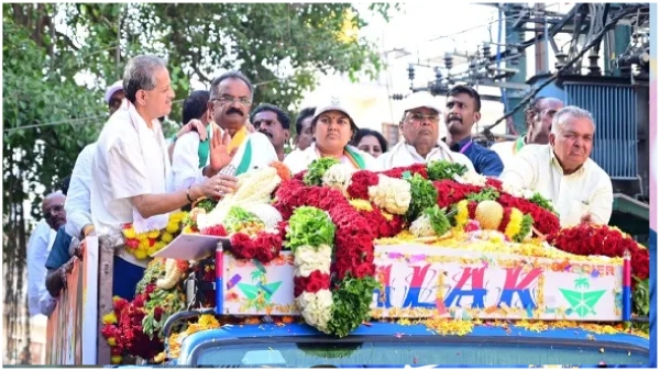 Congress leader who went with a revolver in his waist and garlanded CM Siddaramaiah Congress leader who went with a revolver in his waist and garlanded CM Siddaramaiah