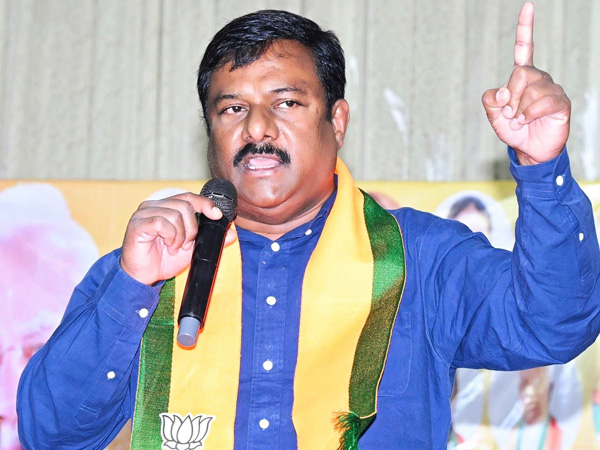 BJP mla Maheshwar Reddy hits out at CM Revanth Reddy for RR tax issue