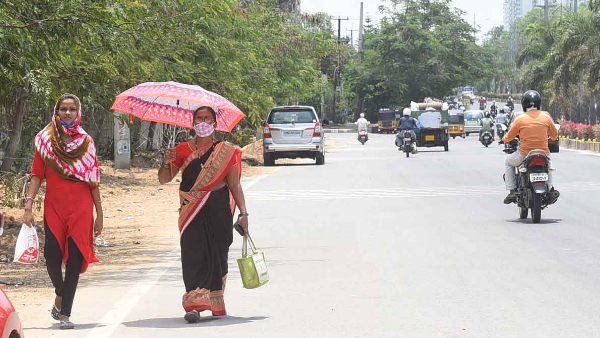 Record breaking temperatures in Telangana heat waves alert in 13 districts IMD key update