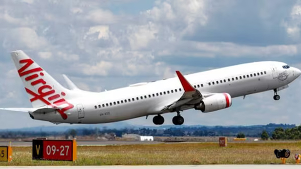 australian police arrested a man for running naked through an airplane