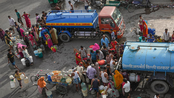 Delhi Water Crisis Deepens Amid Political Turmoil Residents Queue for Tankers