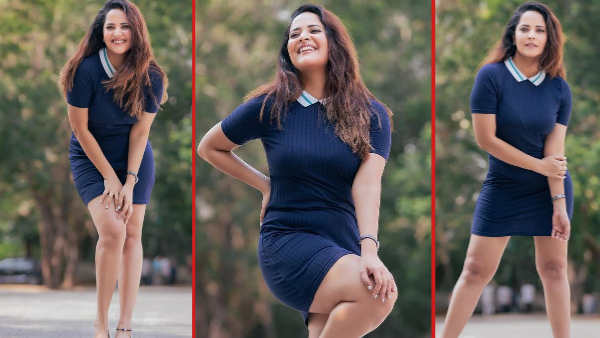 Actress Anasuya Bharadwaj stunning poses in short dress