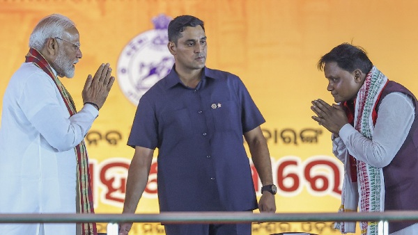 Mohan Charan Majhi swearing in as Odisha CM Modi Patnaik present