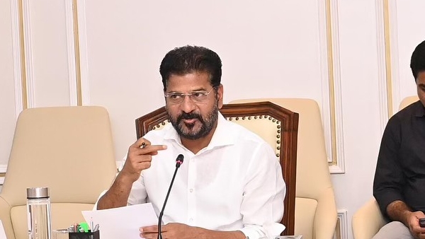 Chief Minister Revanth Reddy distributed safety Moku to Toddy workers Chief Minister Revanth Reddy distributed safety Moku to Toddy workers