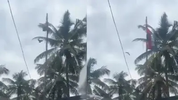 A Bird unfurls the National Flag when it gets stuck during hoisting in Kerala