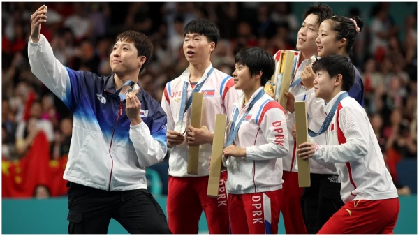 One Podium One Selfie North and South Korean Athletes Celebrate Together