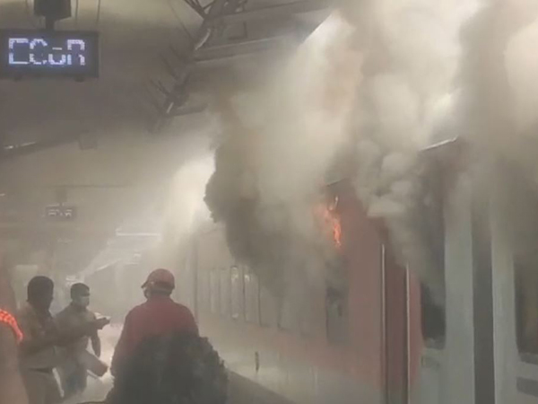 Tirumala express caught by fire at Visakhapatnam Railway station Reports