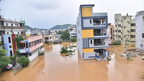 What s behind the heaviest flood in Vijayawada city details here