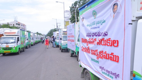 Chandrababu govt kick starts supply food grains to the flood victims in MDU Vehicles Chandrababu govt kick starts supply food grains to the flood victims in MDU Vehicles
