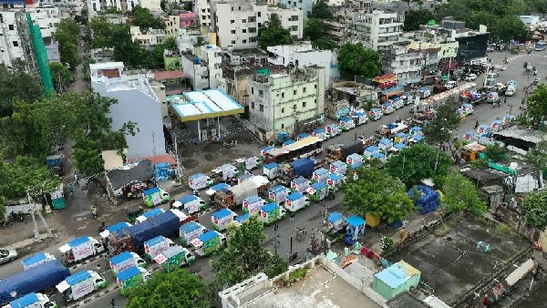 Chandrababu govt kick starts supply food grains to the flood victims in MDU Vehicles Chandrababu govt kick starts supply food grains to the flood victims in MDU Vehicles