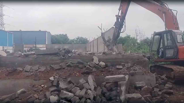 Hydra is demolishing the structures built in the buffer zone in Dundigal