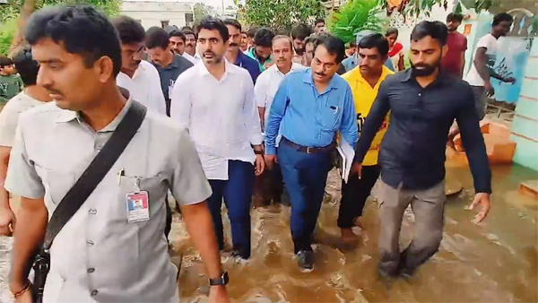Minister Nara Lokesh visits floods affected areas in Mangalagiri Minister Nara Lokesh visits floods affected areas in Mangalagiri
