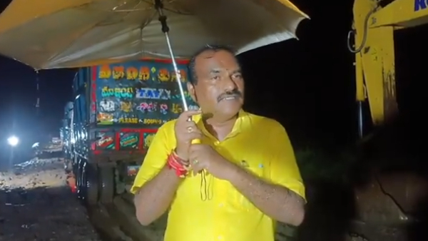 ap water resources minister supervised budameru canal water stoppage works in rain-video viral ap water resources minister supervised budameru canal water stoppage works in rain-video viral