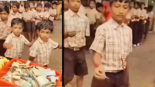 Viral Video Primary School students donates their pocket money to the Vijayawada flood victims Viral Video Primary School students donates their pocket money to the Vijayawada flood victims